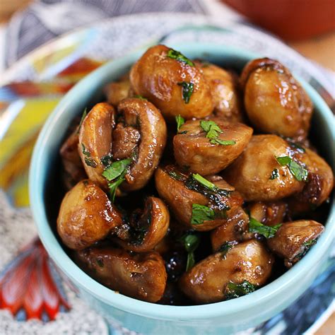 How many calories are in mushrooms sauta©ed with garlic and parsley 1 oz - calories, carbs, nutrition