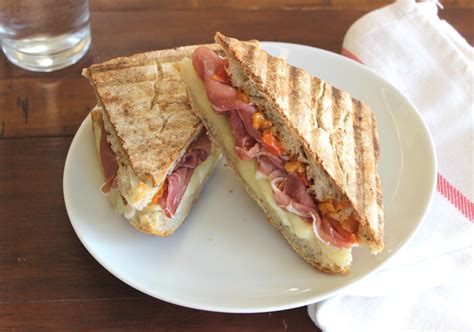 How many calories are in panini grilled cheese prosciutto & pesto sunflower multigrain - calories, carbs, nutrition