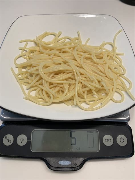 How many calories are in pasta spaghetti cooked basic method 4 oz - calories, carbs, nutrition