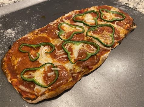 How many calories are in sausage and poblano pizza hand stretched (73694.0) - calories, carbs, nutrition