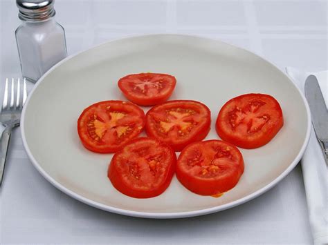 How many calories are in tomato plum sliced 3/8