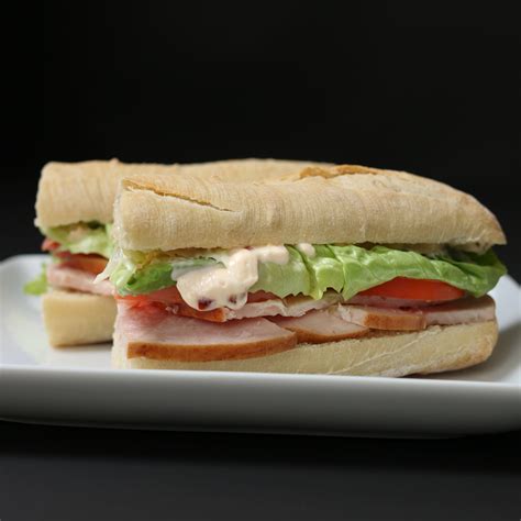 How many calories are in turkey baguette w/low fat arugula mayo - calories, carbs, nutrition