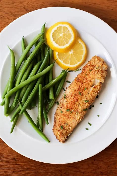 How many calories are in vw-almond crusted tilapia with tomato green beans lentil wild rice salad - calories, carbs, nutrition