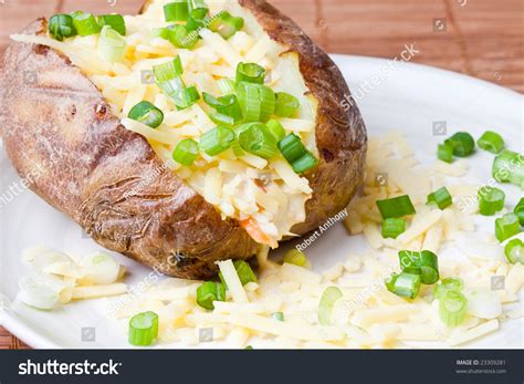 How many carbs are in baked potato with coleslaw and cheddar cheese - calories, carbs, nutrition