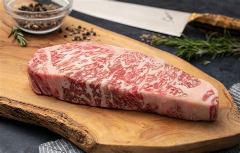 How many carbs are in beef, australian, wagyu, loin, tenderloin steak/roast, boneless, separable lean and fat, aust. marble score 9, raw - calories, carbs, nutrition