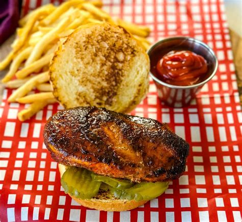 How many carbs are in blackened chicken sandwich with french fries and a 20oz fountain beverage - calories, carbs, nutrition