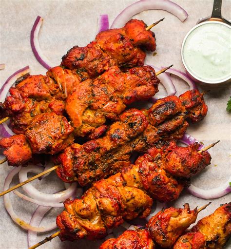 How many carbs are in chicken thigh tikka skewer pulai rice cardamom cauliflower & kachoombar salad - calories, carbs, nutrition