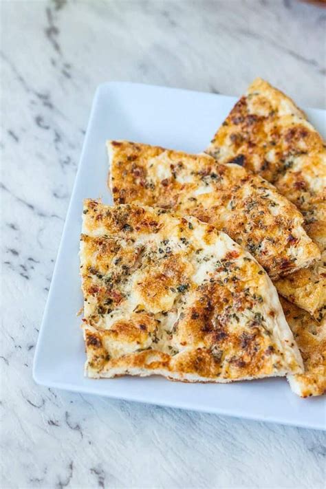 How many carbs are in flatbread with egg hashbrown and cheese (44558.0) - calories, carbs, nutrition