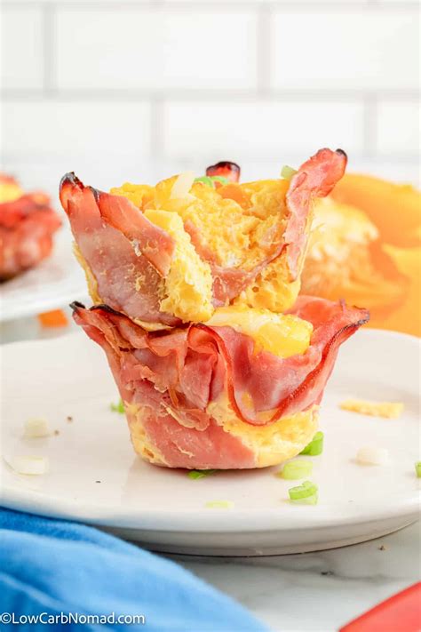 How many carbs are in fried egg o'muffin with ham, american cheese - calories, carbs, nutrition
