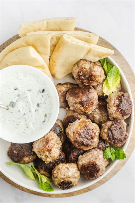 How many carbs are in greek style lamb meatballs with minted yoghurt in a sub roll - calories, carbs, nutrition