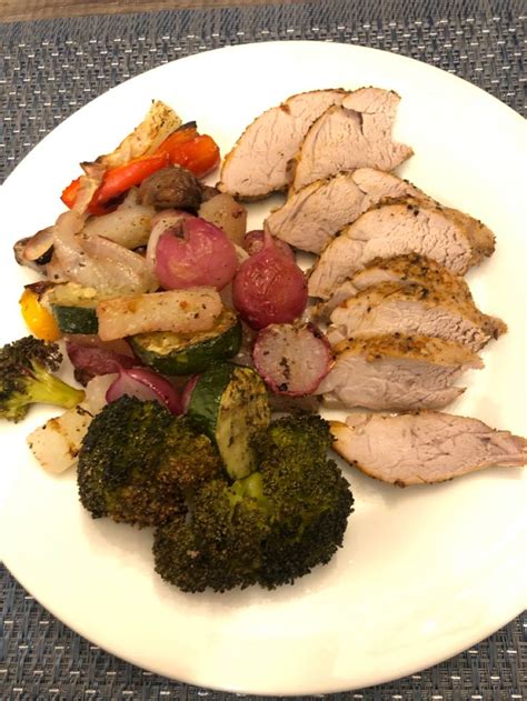 How many carbs are in herb-roasted pork tenderloin with bartlett pears and broccoli rabe - calories, carbs, nutrition