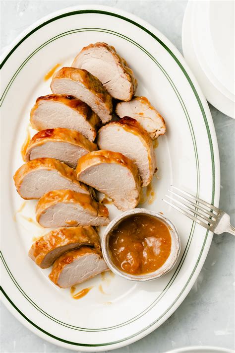 How many carbs are in herb-rubbed pork tenderloin with dijon-apricot mop sauce-occ - calories, carbs, nutrition