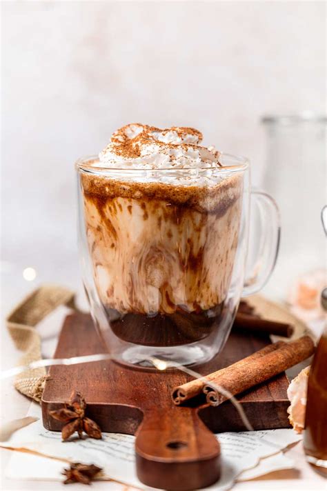 How many carbs are in iced pumpkin spice latte - tall - nonfat milk - with whipped cream - calories, carbs, nutrition