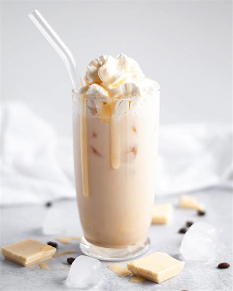 How many carbs are in iced white chocolate mocha - grande - whole milk - with whipped cream - calories, carbs, nutrition