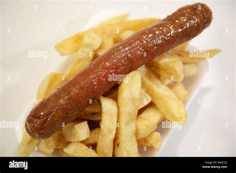 How many carbs are in jumbo sausage in batter served with chips and peas - calories, carbs, nutrition