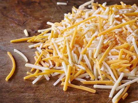 How many carbs are in mexican four cheese shredded - calories, carbs, nutrition