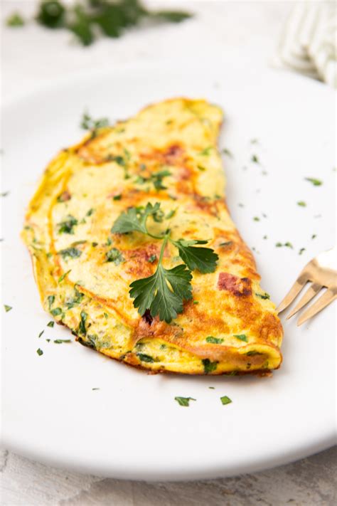 How many carbs are in omelet ham & cheese with fruit salad - calories, carbs, nutrition