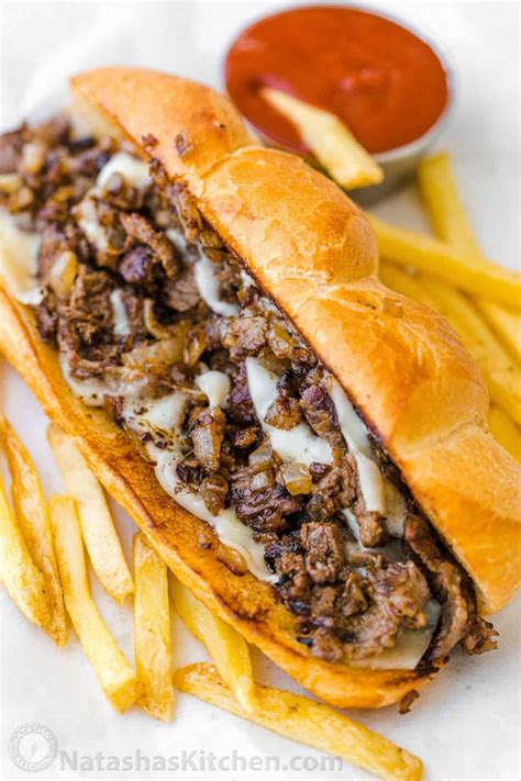 How many carbs are in philly cheese steak with onion roll - calories, carbs, nutrition