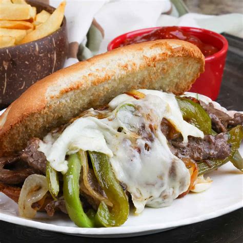 How many carbs are in philly cheese steak withsauteed onions peppers withpotato salad - calories, carbs, nutrition
