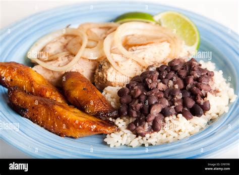 How many carbs are in pork loin roasted fried plantains black beans & rice chili mojo - calories, carbs, nutrition