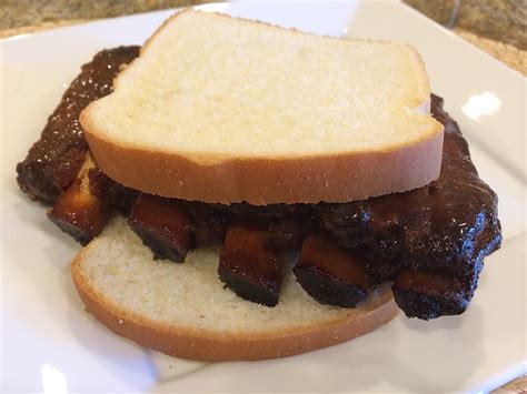 How many carbs are in rib sandwich with white bun - calories, carbs, nutrition