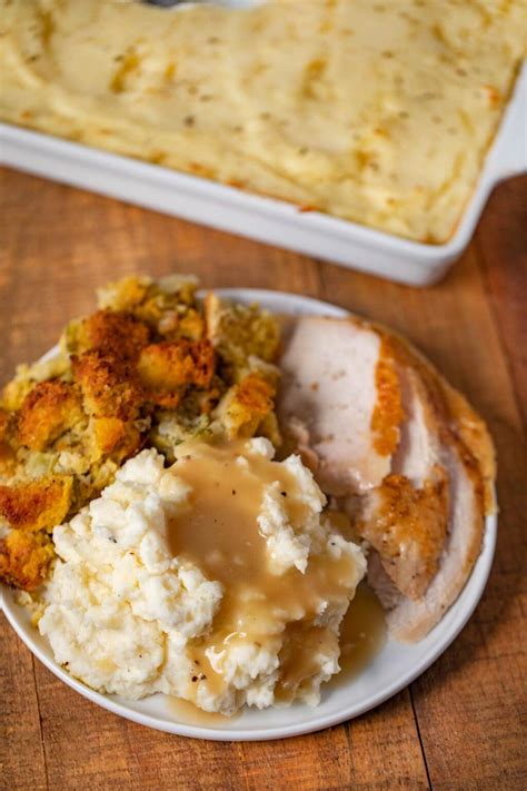 How many carbs are in roast turkey dinner with mashed potato, gravy,stuffing and vegetable - calories, carbs, nutrition