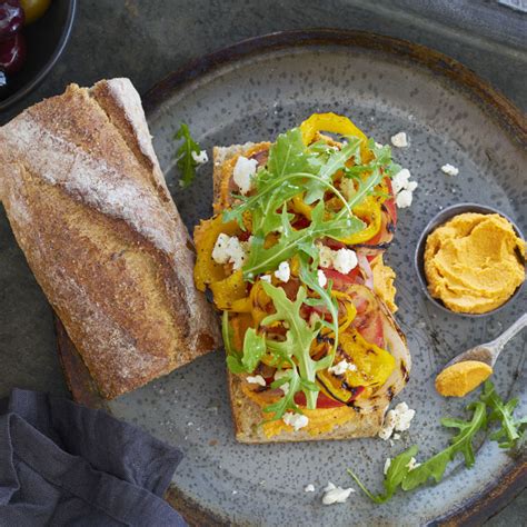 How many carbs are in roasted red pepper hummus and spinach-artichoke sandwich with baby carrots - calories, carbs, nutrition