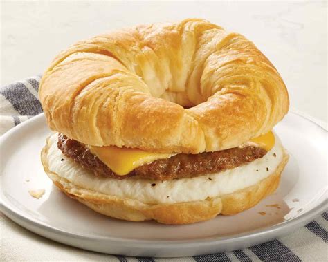 How many carbs are in sand brkf croissant sausage fried egg white & cheese - calories, carbs, nutrition