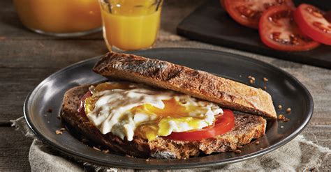 How many carbs are in sausage and egg sunrise sandwich (53108.6) - calories, carbs, nutrition