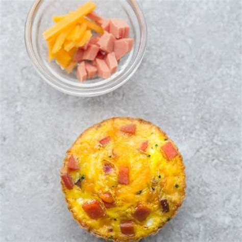 How many carbs are in scrambled egg o'muffin with ham, american cheese - calories, carbs, nutrition