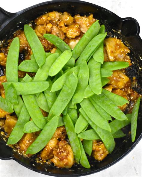 How many carbs are in sesame chicken with snow peas and brown rice - calories, carbs, nutrition