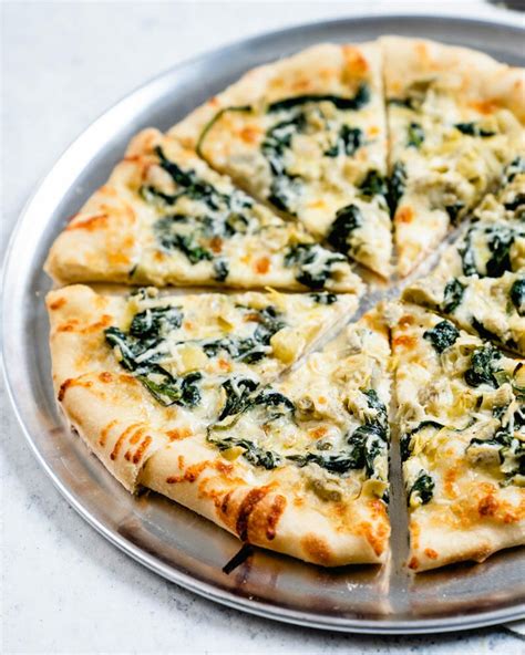 How many carbs are in spinach and artichoke pizza (10