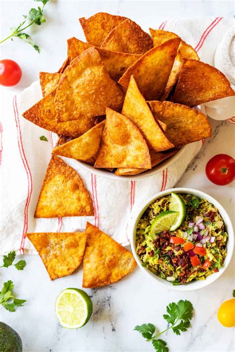 How many carbs are in tortilla chips yellow house fried 48 chips - calories, carbs, nutrition