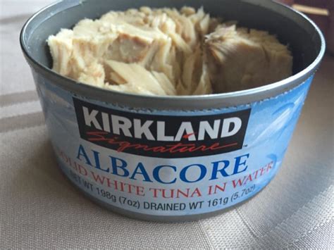 How many carbs are in tuna solid white albacore in water drained 1 oz - calories, carbs, nutrition