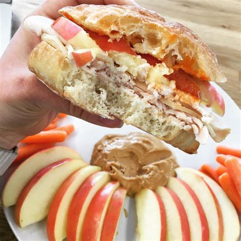 How many carbs are in turkey cheddar ciabatta carrots with broccoli medley and a red apple (70944.71) - calories, carbs, nutrition