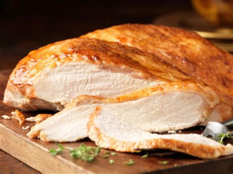 How many carbs are in turkey from whole, enhanced, light meat, meat only, cooked, roasted - calories, carbs, nutrition