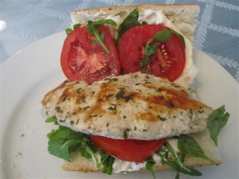 How many carbs are in tuscan chicken sandwich with sun-dried tomato vinaigrette and potato salad - calories, carbs, nutrition