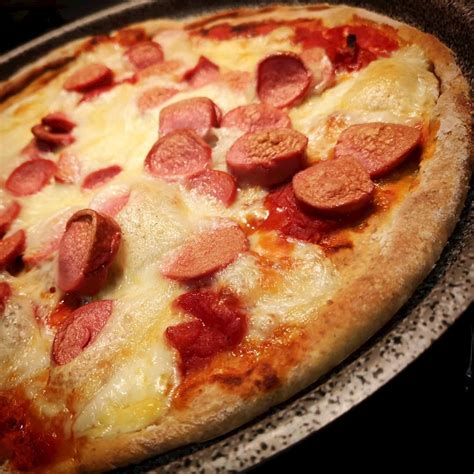 How many carbs are in viennese roman style pizza - by the ounce - calories, carbs, nutrition