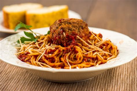 How many carbs are in whole wheat spaghetti and quorn meatballs with marinara sauce, swiss cheese, broccoli (400veg) - calories, carbs, nutrition