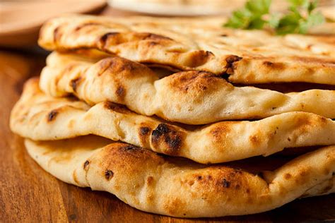 How many protein are in accompanying naan bread with sambols - calories, carbs, nutrition