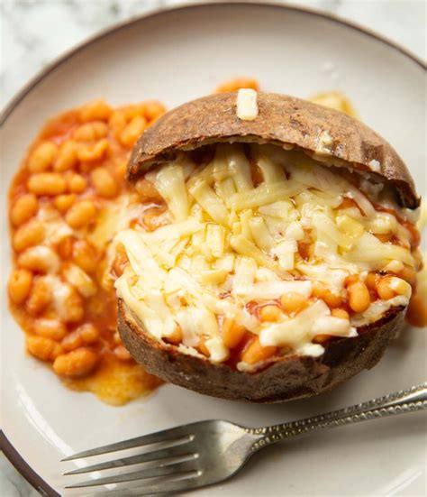 How many protein are in baked jacket potato with cheese and baked beans - calories, carbs, nutrition