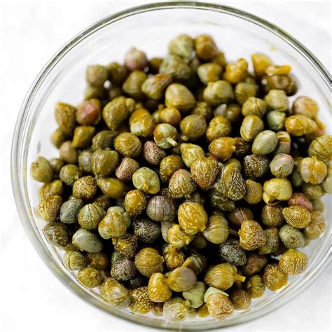 How many protein are in capers drained 1 oz - calories, carbs, nutrition