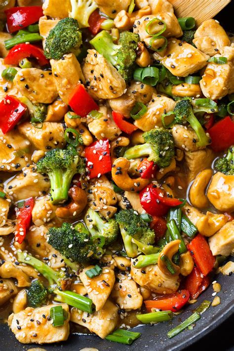 How many protein are in cashew chicken with broccoli and rice and vegetarian egg roll - calories, carbs, nutrition