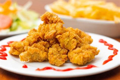 How many protein are in chicharrones de pollo - latin fried chicken (102834.0) - calories, carbs, nutrition