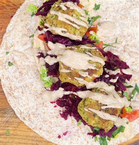 How many protein are in falafel and pesto flat bread with a raita slaw - calories, carbs, nutrition