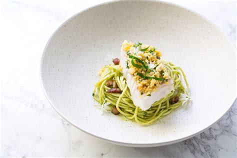 How many protein are in fresh cod loin encrusted in spaghetti squash and served in a carrot, celery root broth w/white bean - calories, carbs, nutrition