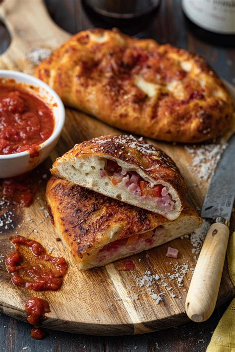 How many protein are in ham and cheese calzone - calories, carbs, nutrition