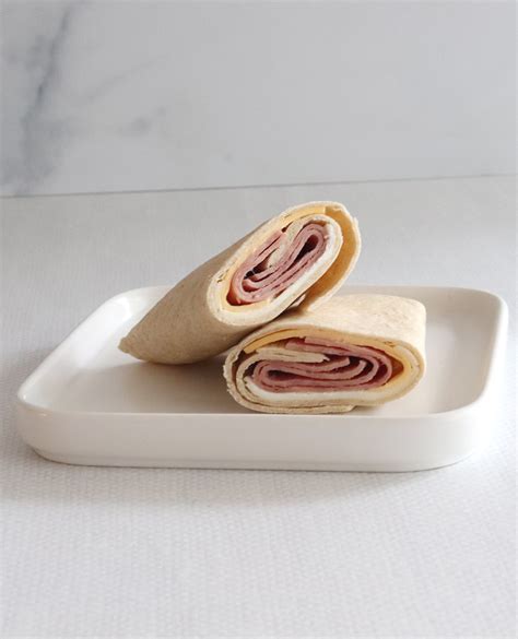 How many protein are in ham cheddar white wrap (52189.22) - calories, carbs, nutrition