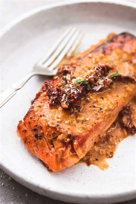 How many protein are in herbed salmon with sun-dried tomato sauce - calories, carbs, nutrition