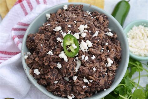 How many protein are in on the border, refried beans - calories, carbs, nutrition